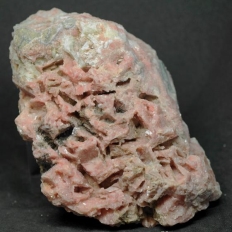 菱マンガン鉱・Rhodochrosite [重晶石のヌケガラ]